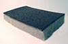 rectangular view of SAPT220 sound barrier mat with black face on grey foam