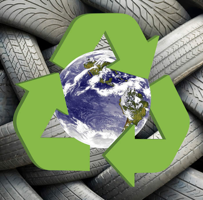 green recycled logo over photo of the world and pile of tyres