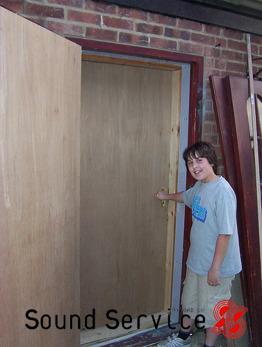 double door entry system into soundproofed garage