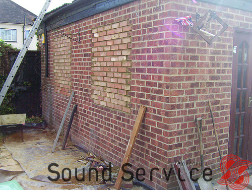 Soundproof a Garage - Bricked up the windows