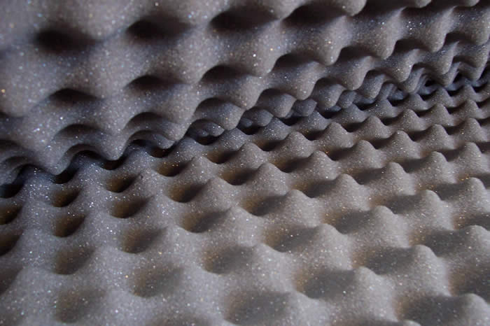 close-up of Egg Box acoustic tiles being separated