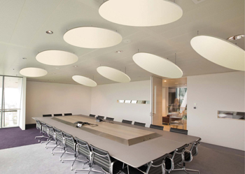 white circular cloudsorption shapes suspended from ceiling of an office
