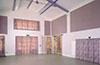 Wallsorption sound absorbing coloured panels fixed to upper walls of hall
