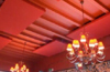 red Cloudsorption sound absorbing panels suspended from a ceiling